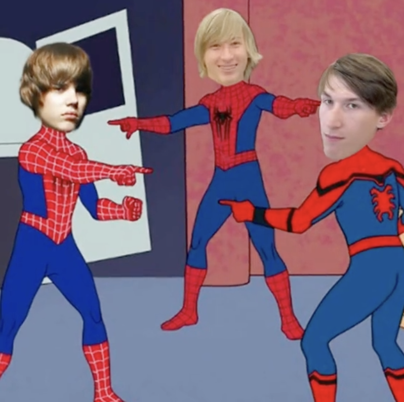 two young men and Justin Bieber in cartoon spiderman outfits